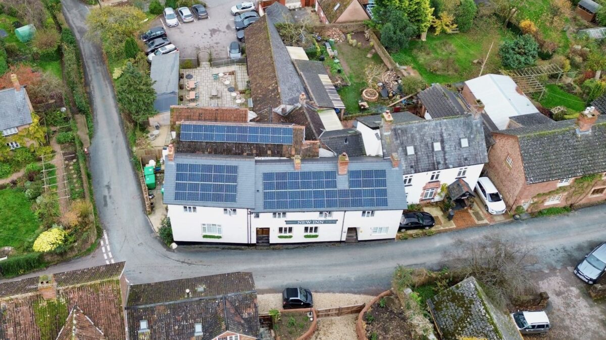 An aerial photo of solar panels on a pub